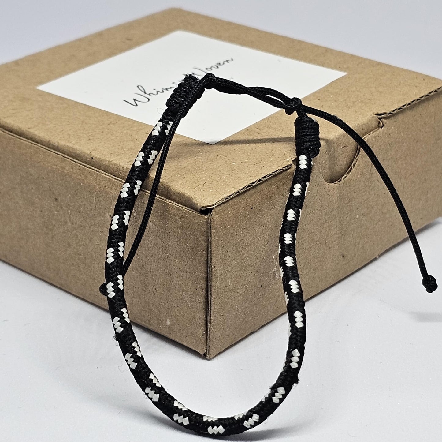 WhimsyWoven Handmade Ethnic Cord Bracelet – Adjustable Unisex Accessory Edition Boho Vibes for Everyday Wear (Black with White Stripe)